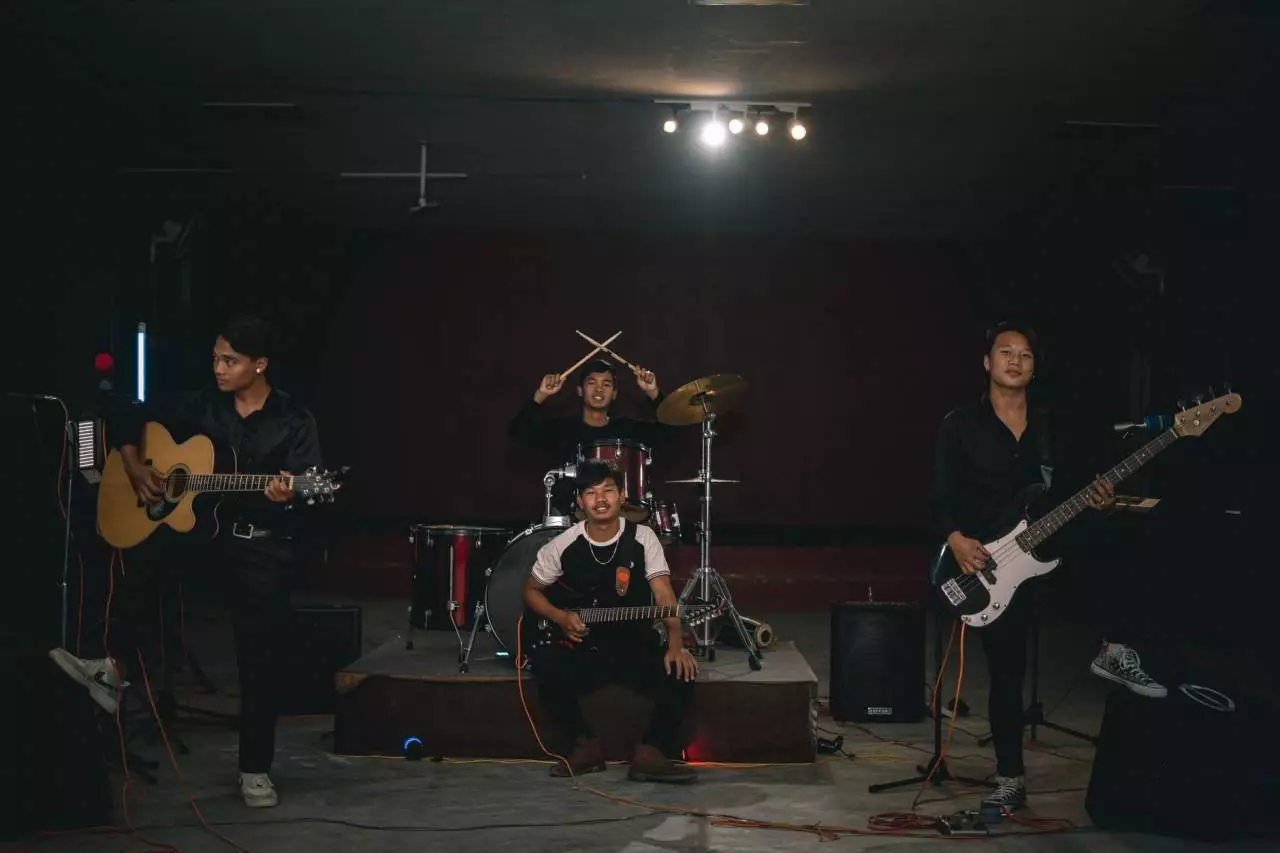Asian band performing live representing the top Myanmar hit songs and Burmese pop music trends for 2026