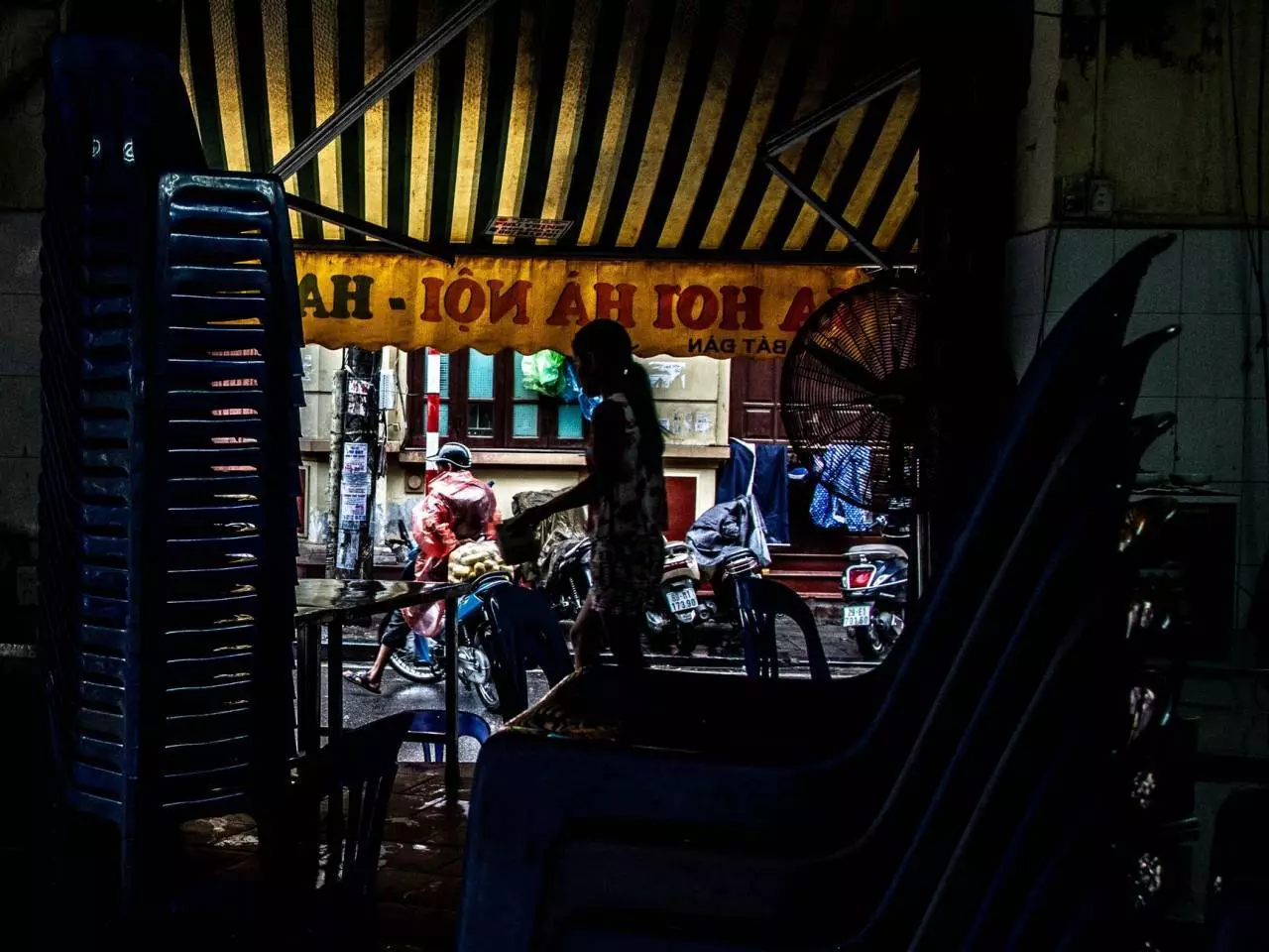 Southeast Asia street scene at dusk representing the everyday struggles and vibrant life of Myanmar people in 2026